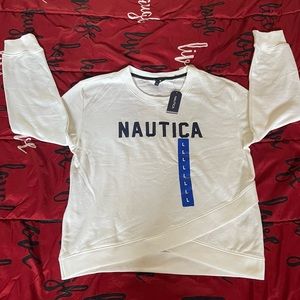 Nautica brand white sweatshirt with navy blue lettering.